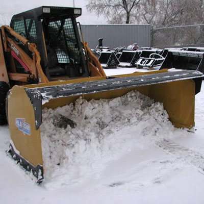 HLA 2500 series Snow Pusher mounted on a Case skid steer pushing snow