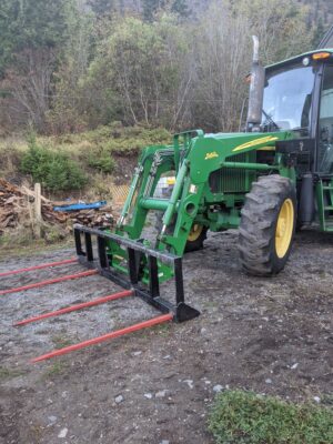 4 prong 100 in wide bale spear on JD tractor